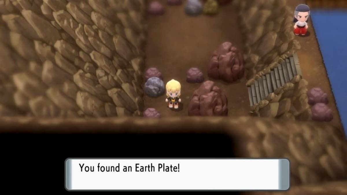 A trainer finding the Earth Plate in Pokemon Brilliant Diamond and Shining Pearl. (Image via ILCA)