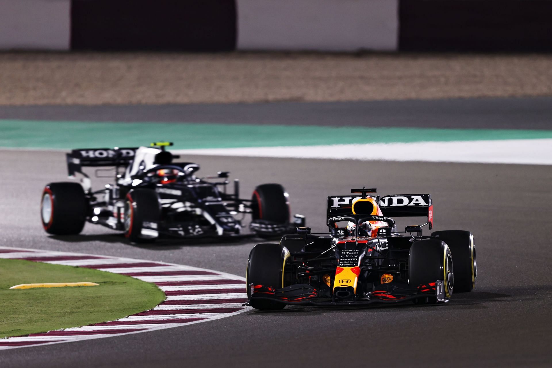 F1 Grand Prix of Qatar - Max Verstappen passes Pierre Gasly.