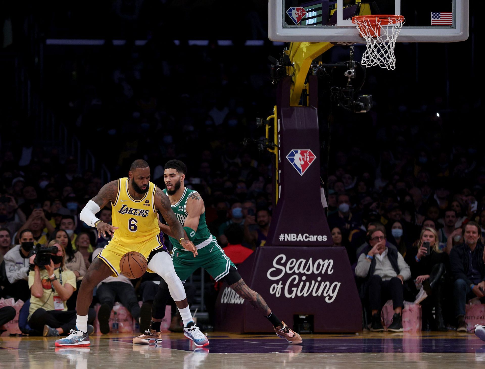LeBron James of the LA Lakers posts up Jayson Tatum of the Boston Celtics during a 117-102 win Dec. 7, 2021, in Los Angeles, California.