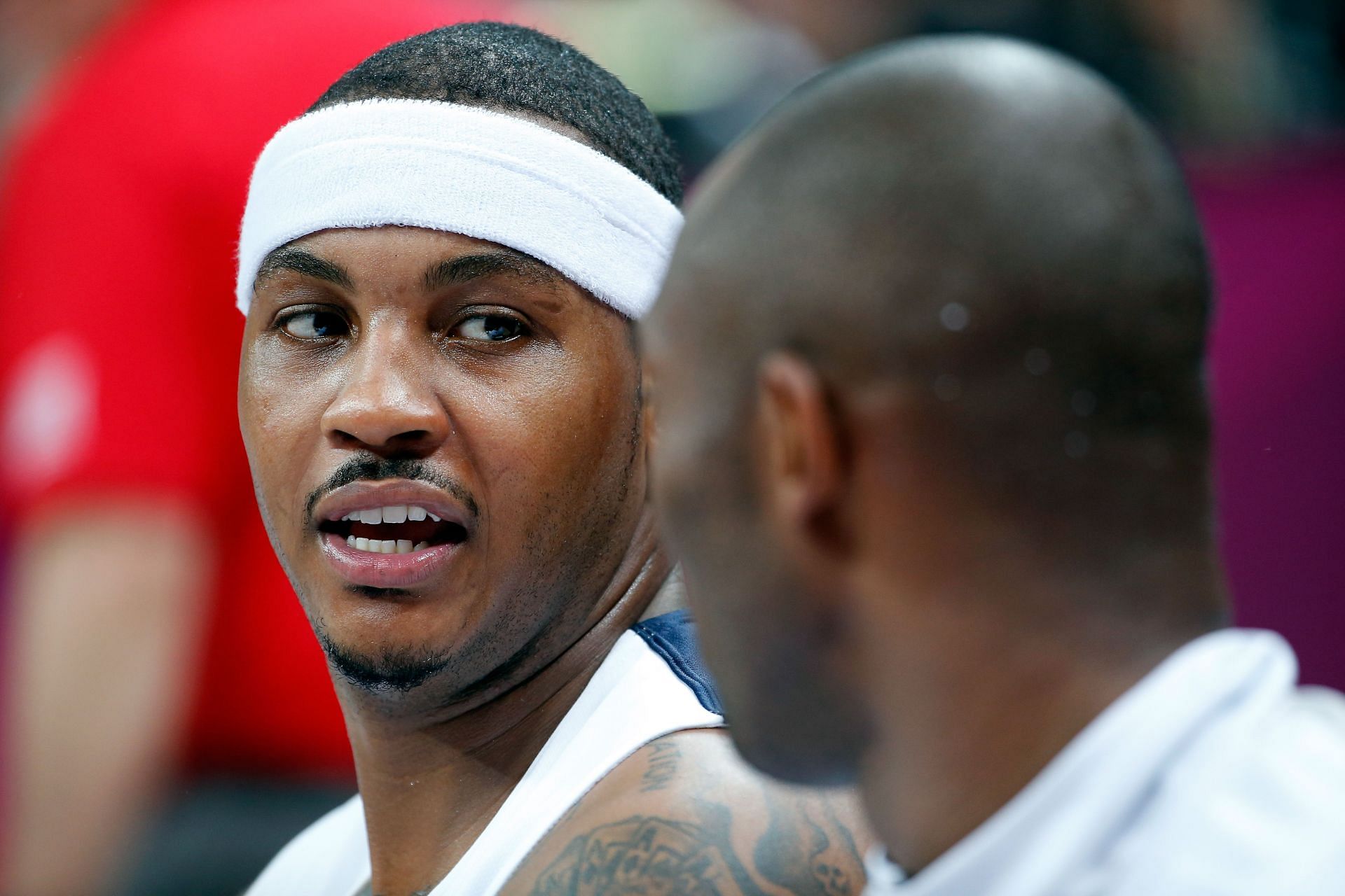 Carmelo Anthony #15 talks with teammate Kobe Bryant #10 of United States during their Men&#039;s Basketball Game against France on Day 2 of the London 2012 Olympic Games at the Basketball Arena on July 29, 2012 in London, England.