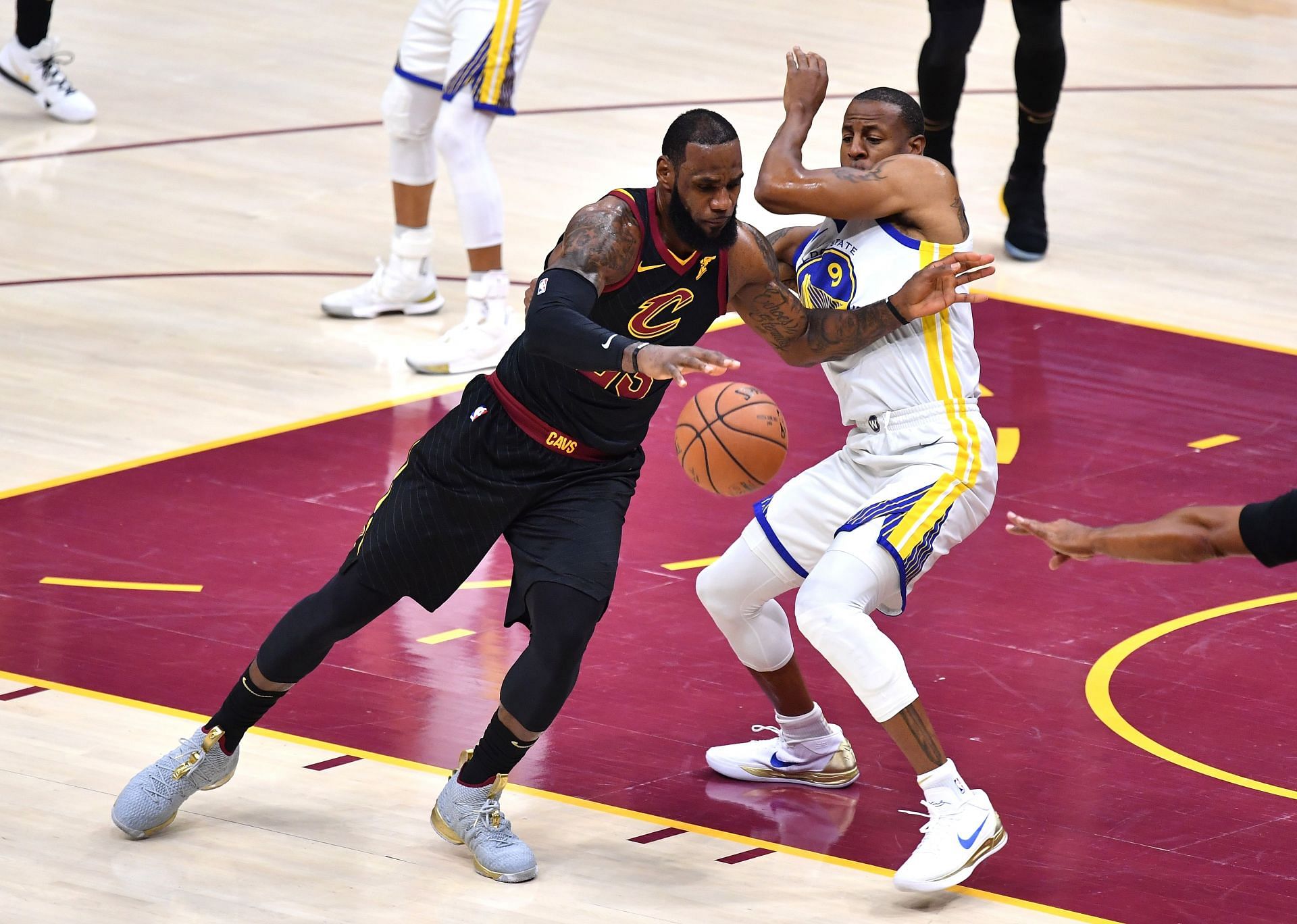 LeBron James #23 of the Cleveland Cavaliers drives to the basket defended by Andre Iguodala #9 of the Golden State Warriors in Game 3 of the 2018 NBA Finals.