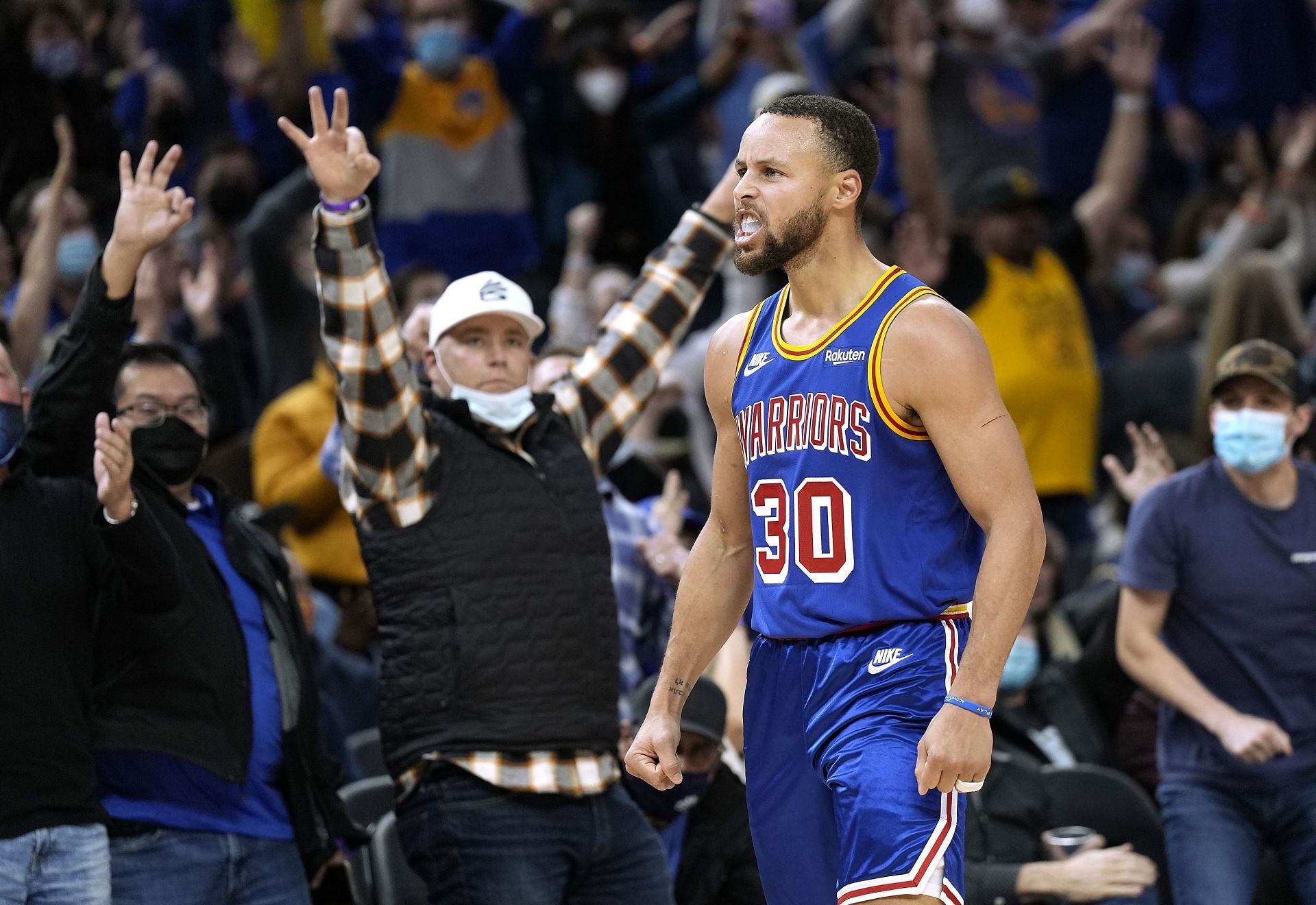 Stephen Curry of the Golden State Warriors reacts after making a 3-point shot against the Memphis Grizzlies during the fourth quarter on Dec. 23 in San Francisco, California.