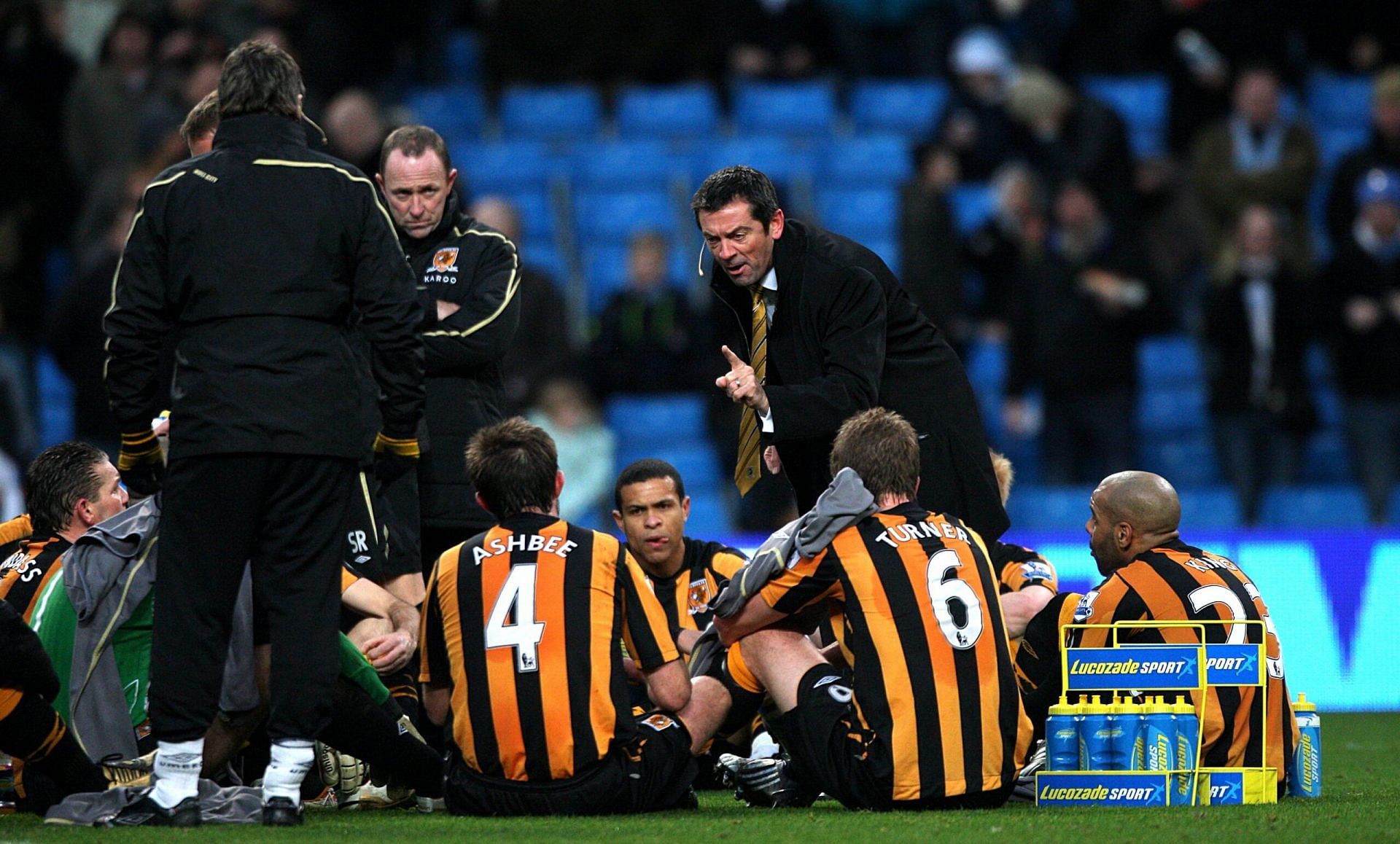 Former Hull City manager Phil Brown delivering his post-match team talk on the pitch.