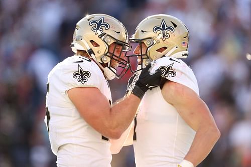 The New Orleans Saints' Garrett Griffin and Taysom Hill