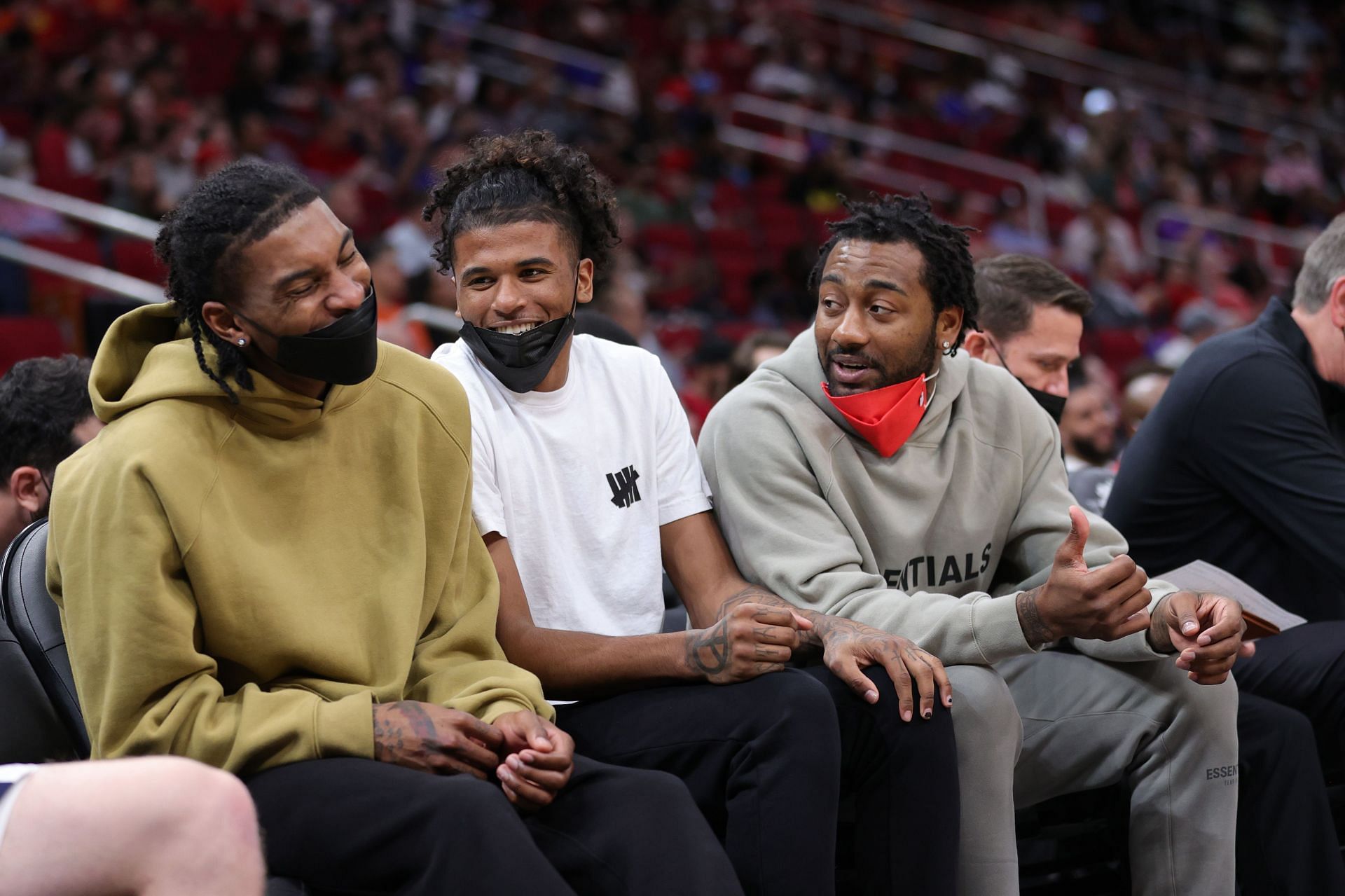 John Wall, Jalen Green, and Kevin Porter Jr. of the Houston Rockets on the bench