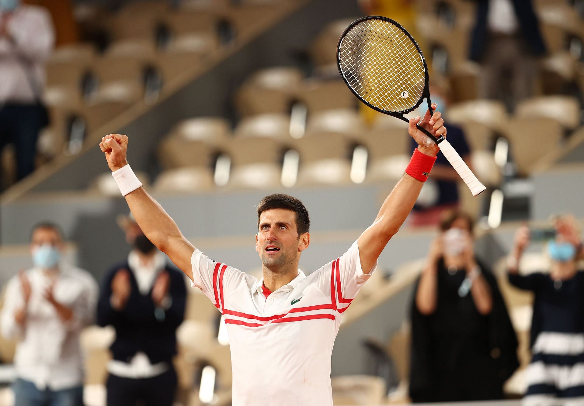 Novak Djokovic celebrates beating Rafael Nadal at the 2021 French Open