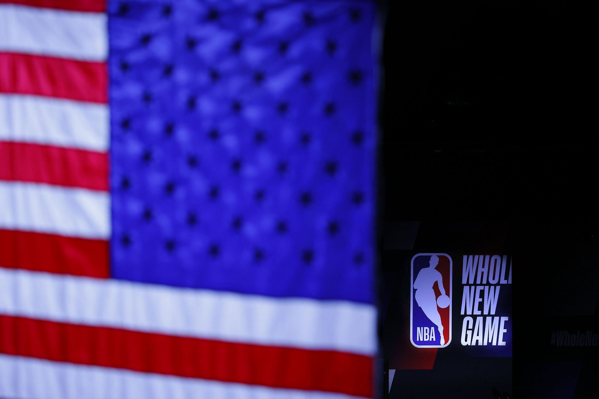 The NBA Whole New Game logo is seen before the start of a game.