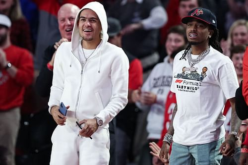 Trae Young, left, and Quavo courtside at Kentucky v Georgia