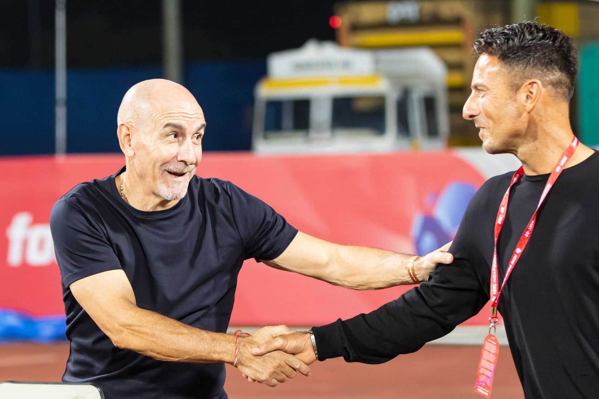 Antonio Lopez Habas and Marco Pezzaiuoli shaking hands after the game. (Image Courtesy: Twitter/IndSuperLeague)