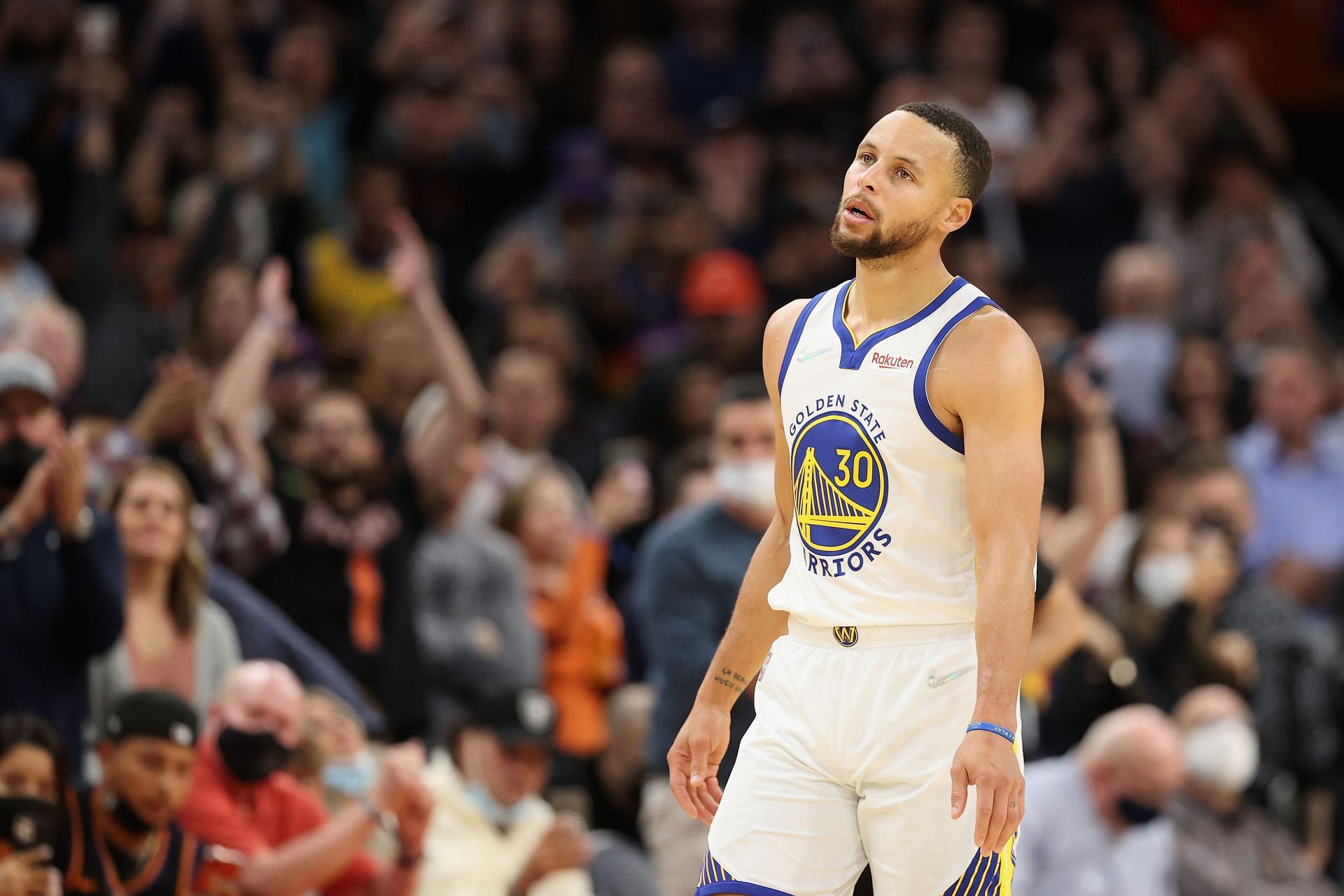 Steph Curry #30 of the Golden State Warriors walks off the court following the NBA game against the Phoenix Suns at Footprint Center on November 30, 2021 in Phoenix, Arizona.
