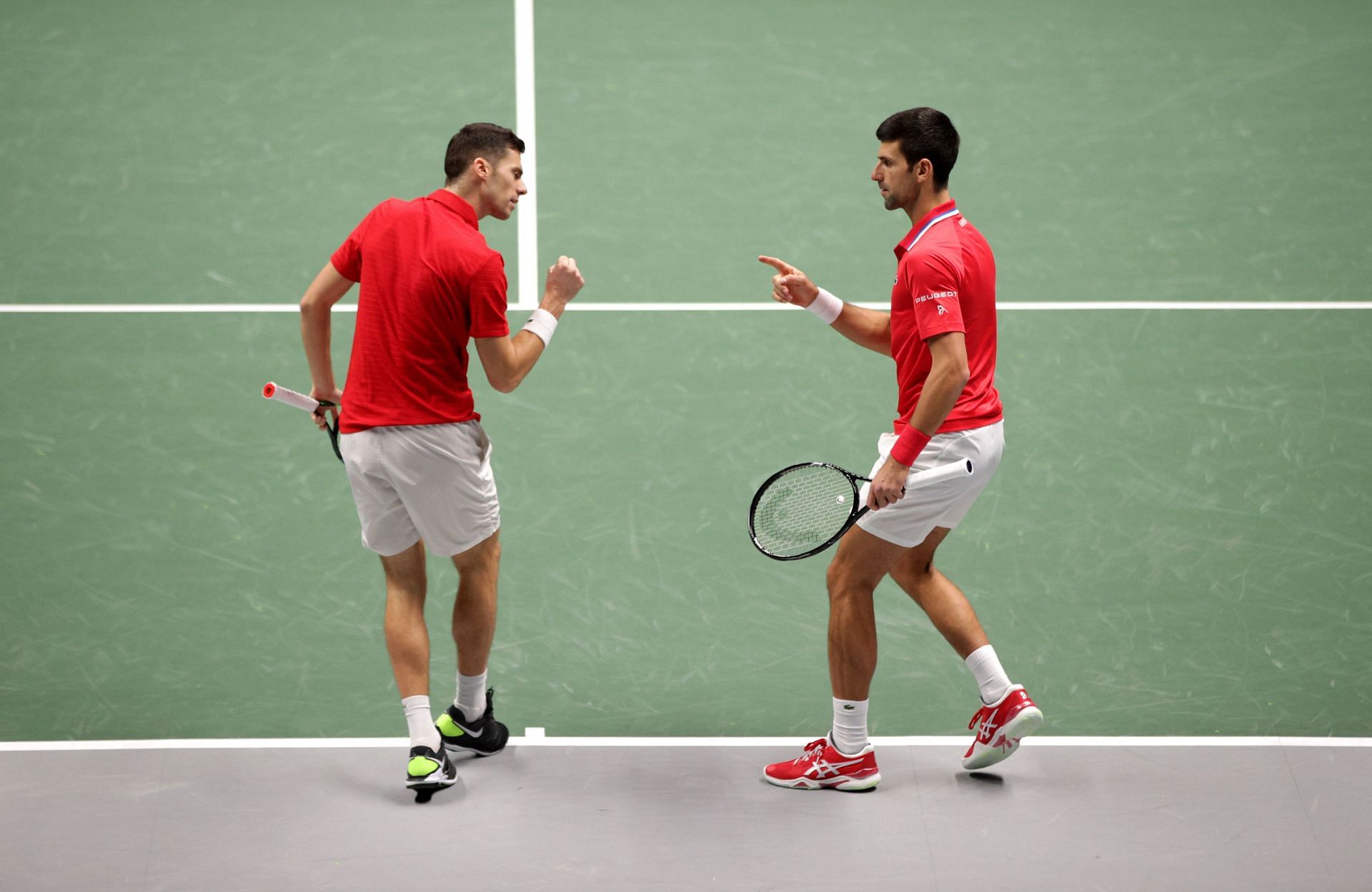 Novak Djokovic and Nikola Cacic during Serbia&#039;s doubles loss to Germany at the Davis Cup Finals 2021