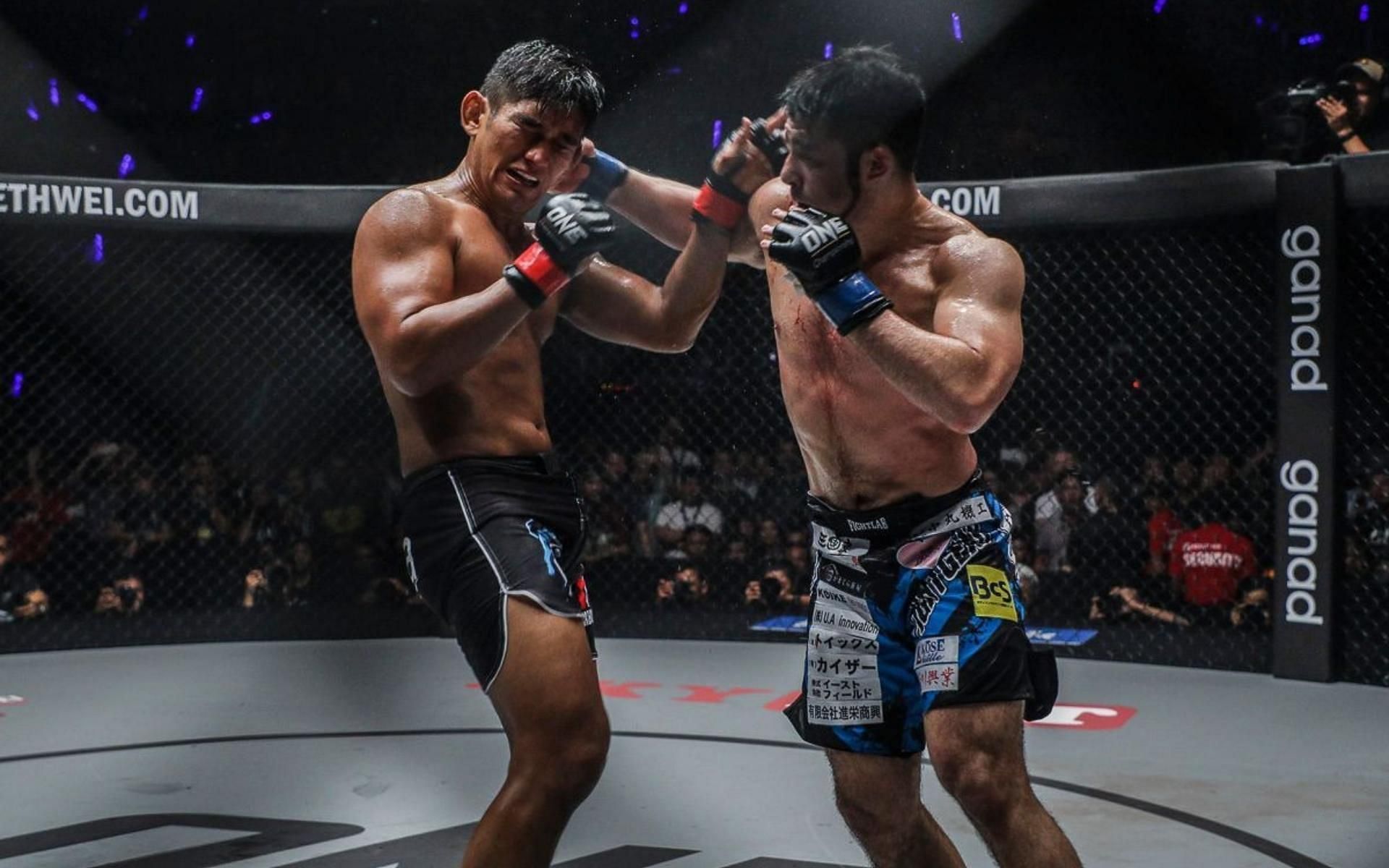 The bout between Aung La Nsang (left) and Ken Hasegawa (right) for the ONE Championship middleweight belt was one of the greatest in MMA history. (Image courtesy of ONE Championship)