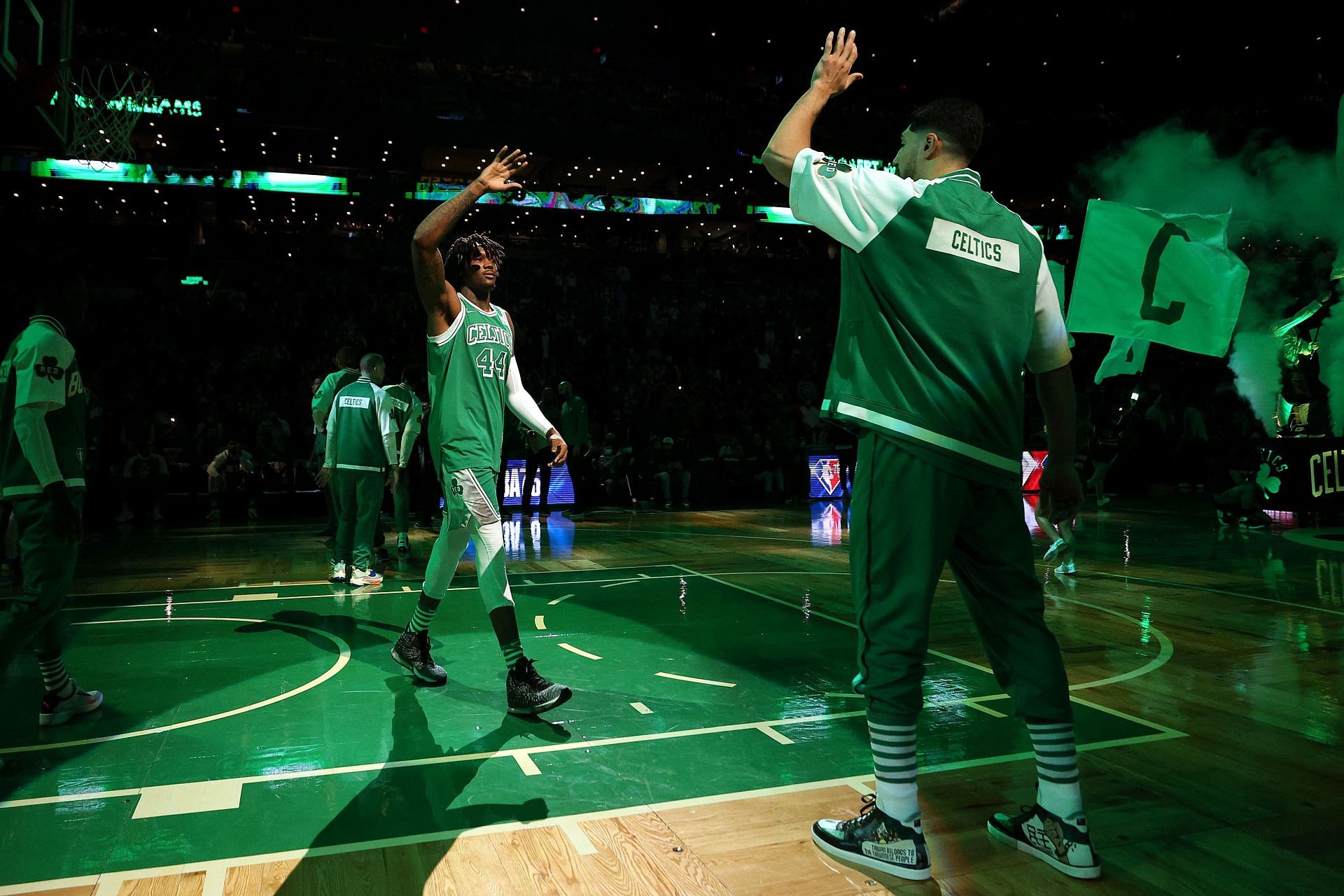 Robert Williams (left) is introduced at the Boston Celtics game