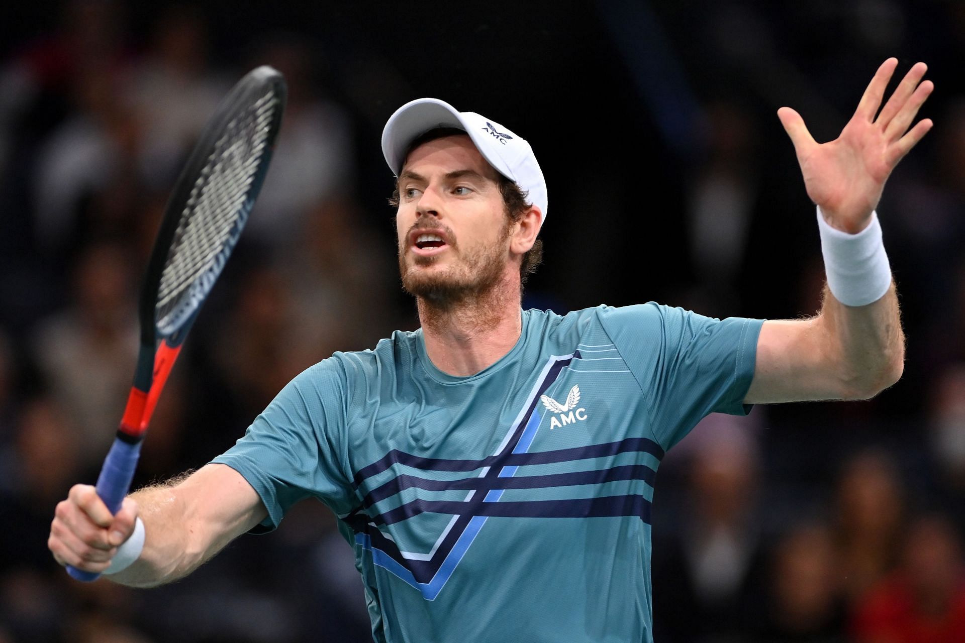 Andy Murray plays a backhand volley at the 2021 Rolex Paris Masters