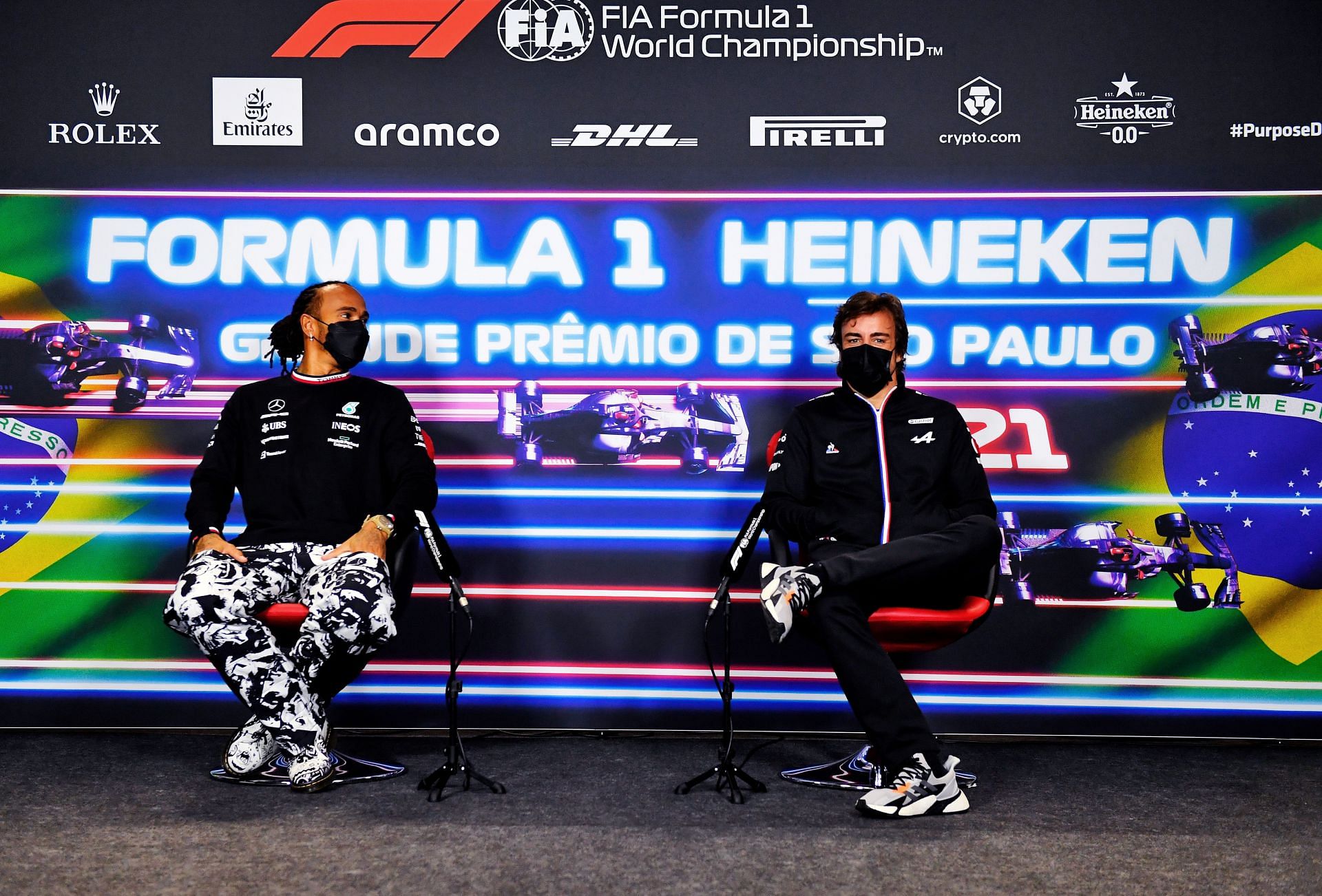 Lewis Hamilton (left) and Fernando Alonso (right) (Photo by Rudy Carezzevoli - Pool/Getty Images)
