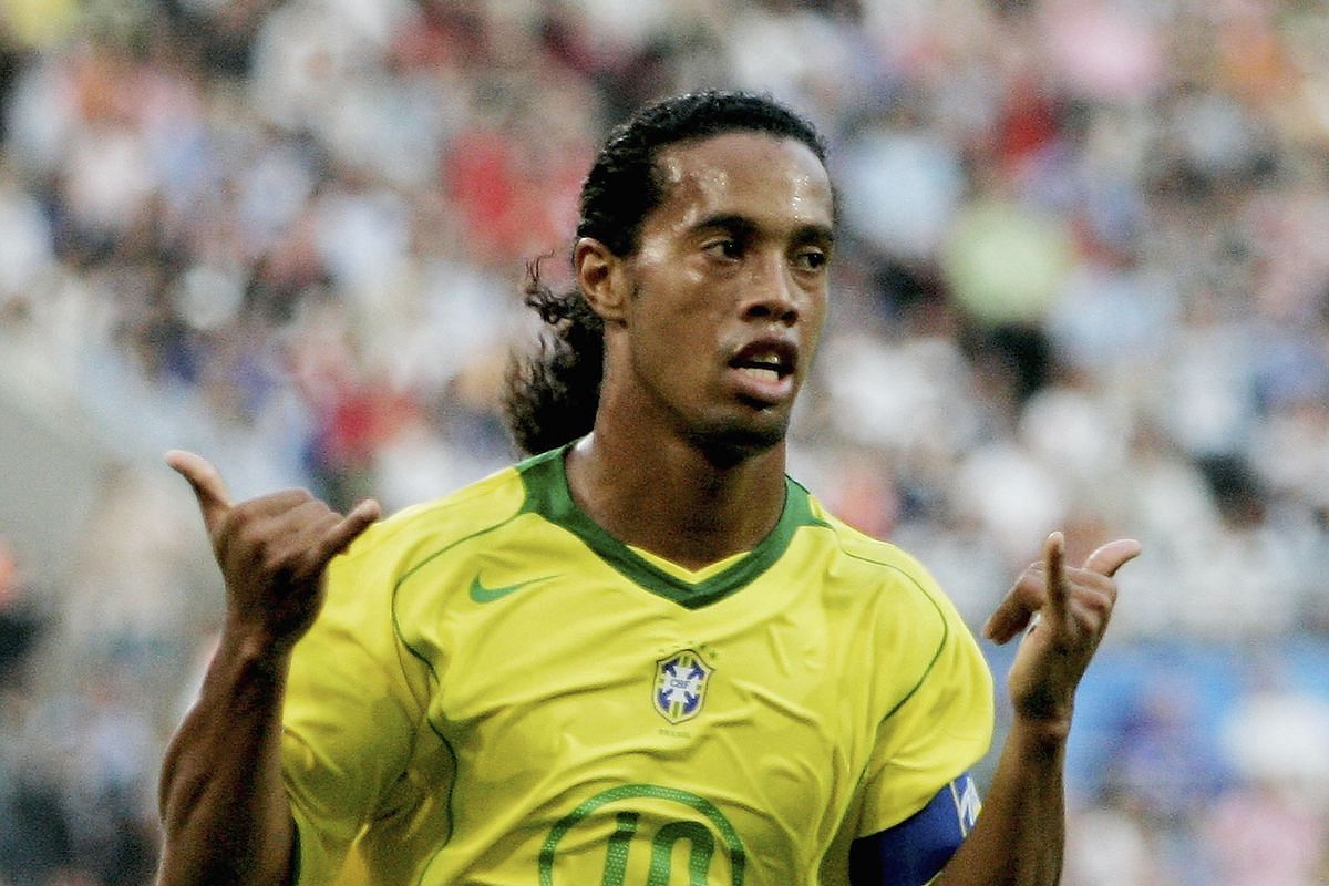Ronaldinho doing his trademark celebration after scoring a goal for Brazil