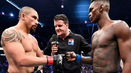 Robert Whittaker (left) and Israel Adesanya (right)