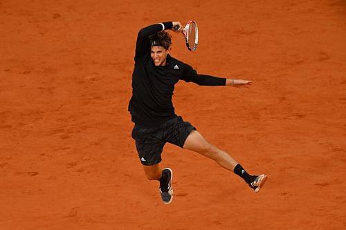 Dominic Thiem strikes a forehand at the 2020 French Open