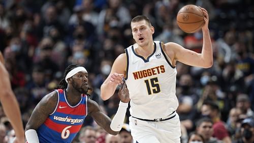 Nikola Jokic of the Denver Nuggets against Montrezl Harrell of the Washington Wizards [Source: AP]