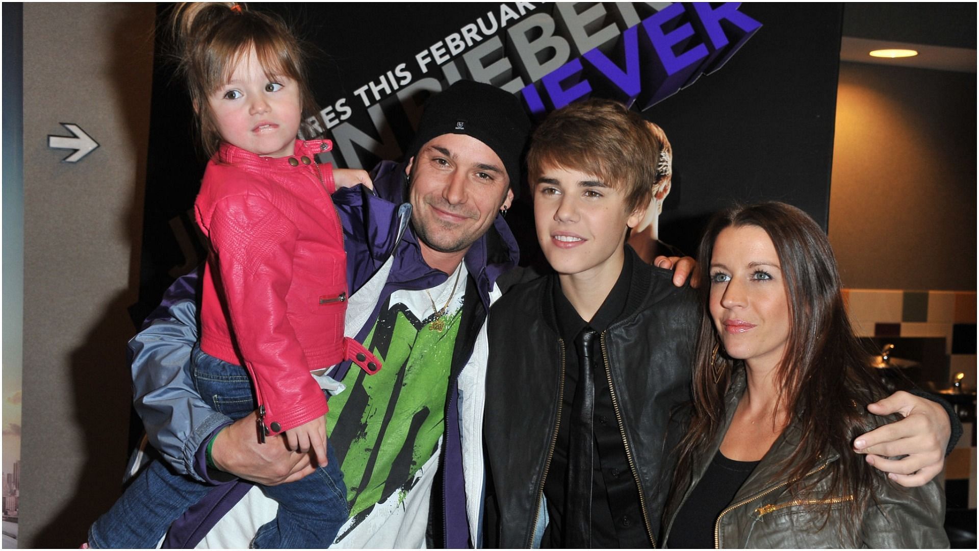 Sister Jazmyn Bieber, father Jeremy Bieber, singer Justin Bieber and mother Pattie Lynn Mallete attend the premiere for &quot;Never Say Never&quot; (Image via Getty Images)