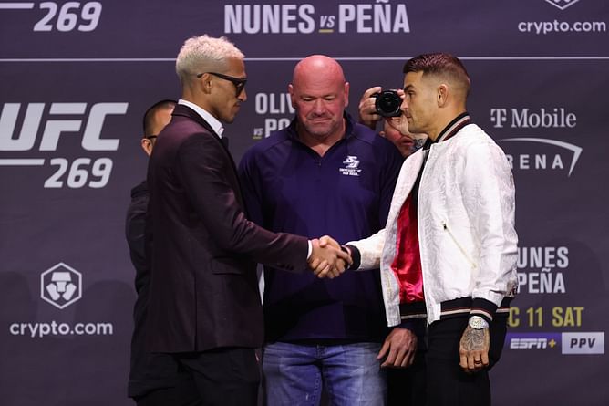 Watch: Dustin Poirier pledges $20,000 to a charity of Charles Oliveira's choice after their UFC 269 barnburner