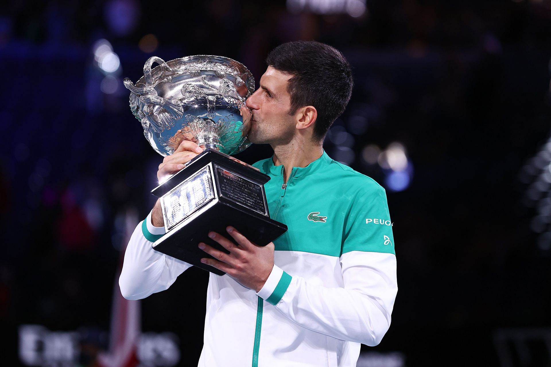 Novak Djokovic with the 2021 Australian Open trophy
