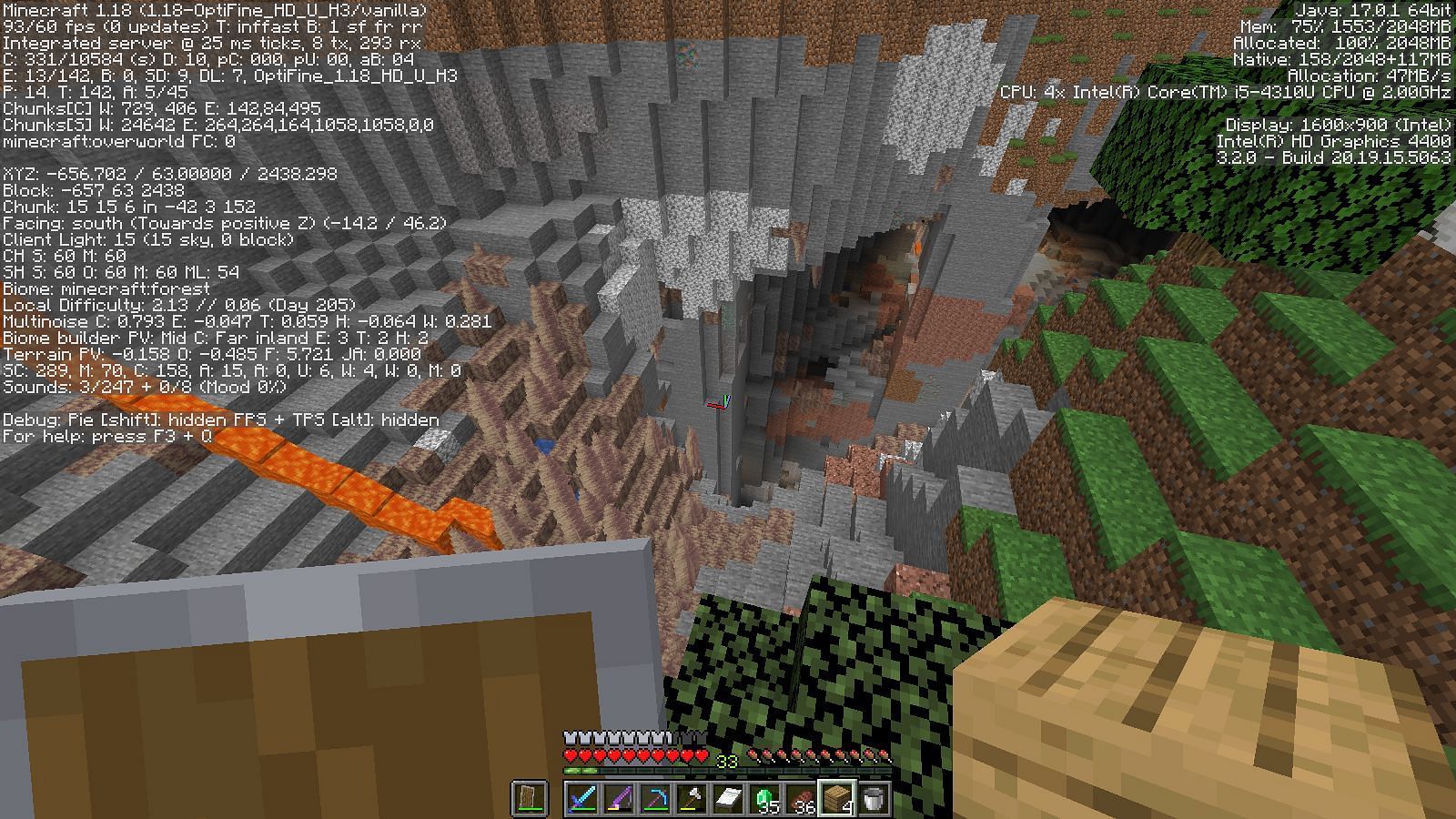 Huge ravine reaching a cave (Image via Minecraft)