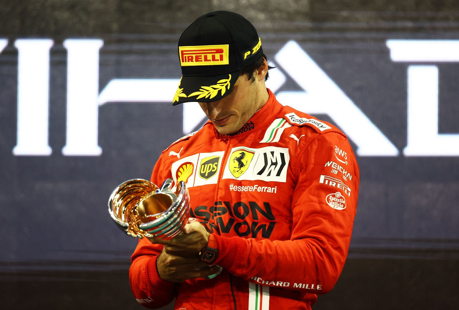 F1 Grand Prix of Abu Dhabi - Carlos Sainz looks at his trophy.