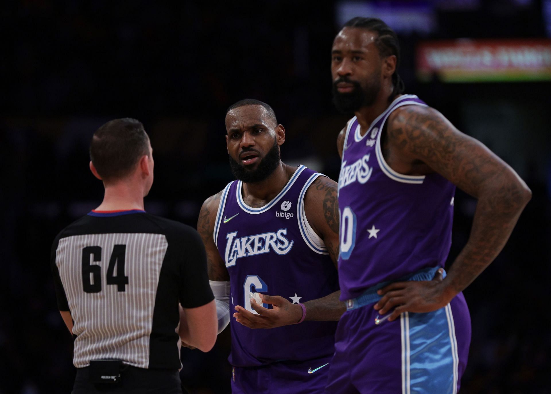 LeBron James (#6) and DeAndre Jordan of the LA Lakers react against the San Antonio Spurs