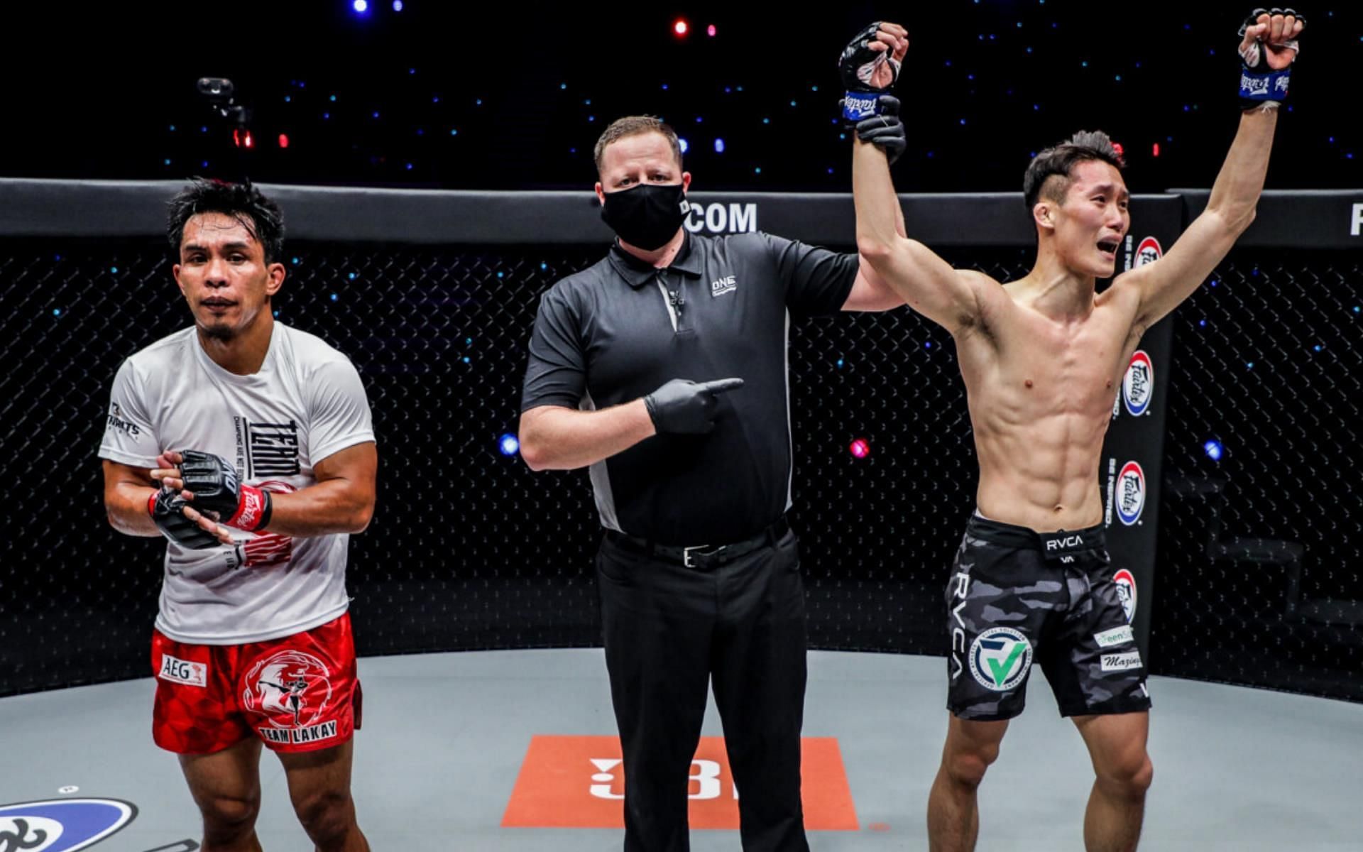 Kevin Belingon (Left) acknowledges the incredible win by Kwon Won Il (Right) | [Photo: ONE Championship]