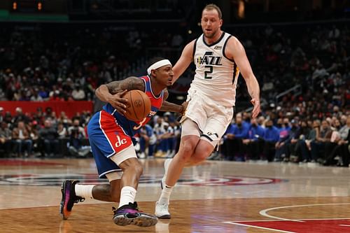 Joe Ingles of the Utah Jazz guards Bradley Beal of the Washington Wizards