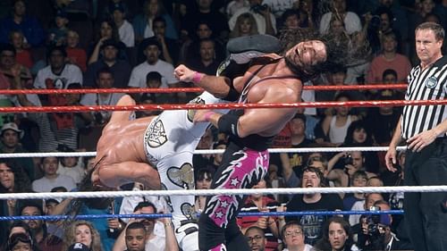 Shawn Michaels superkicks Bret Hart at Wrestlemania 12