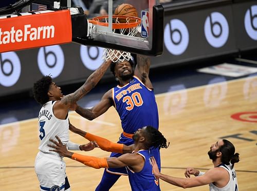 New York Knicks' Julius Randle dunks against Minnesota Timberwolves