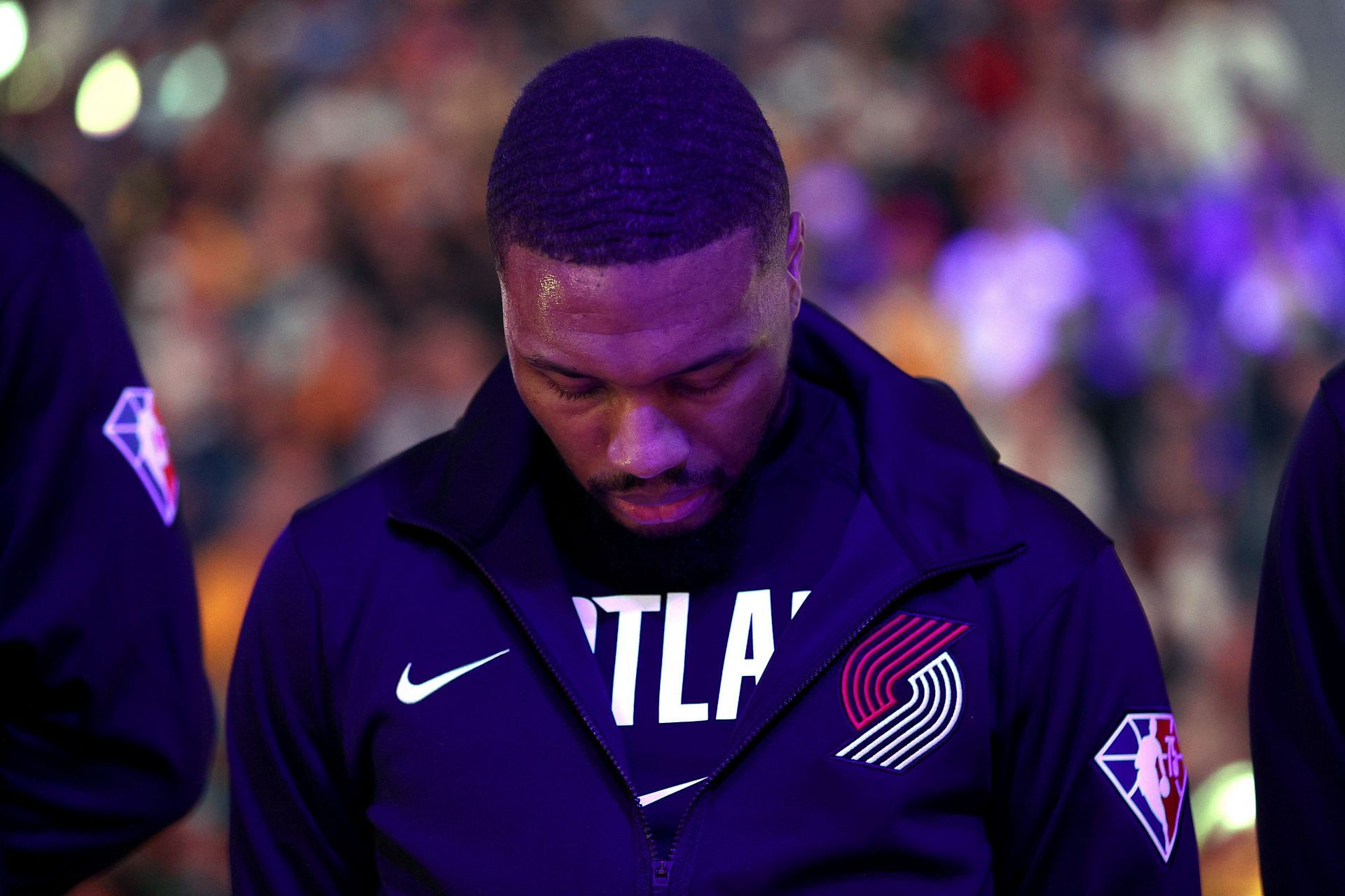 Damian Lillard #0 of the Portland Trail Blazers stands during the national anthem before the game against the Golden State Warriors at Chase Center on November 26, 2021 in San Francisco, California.