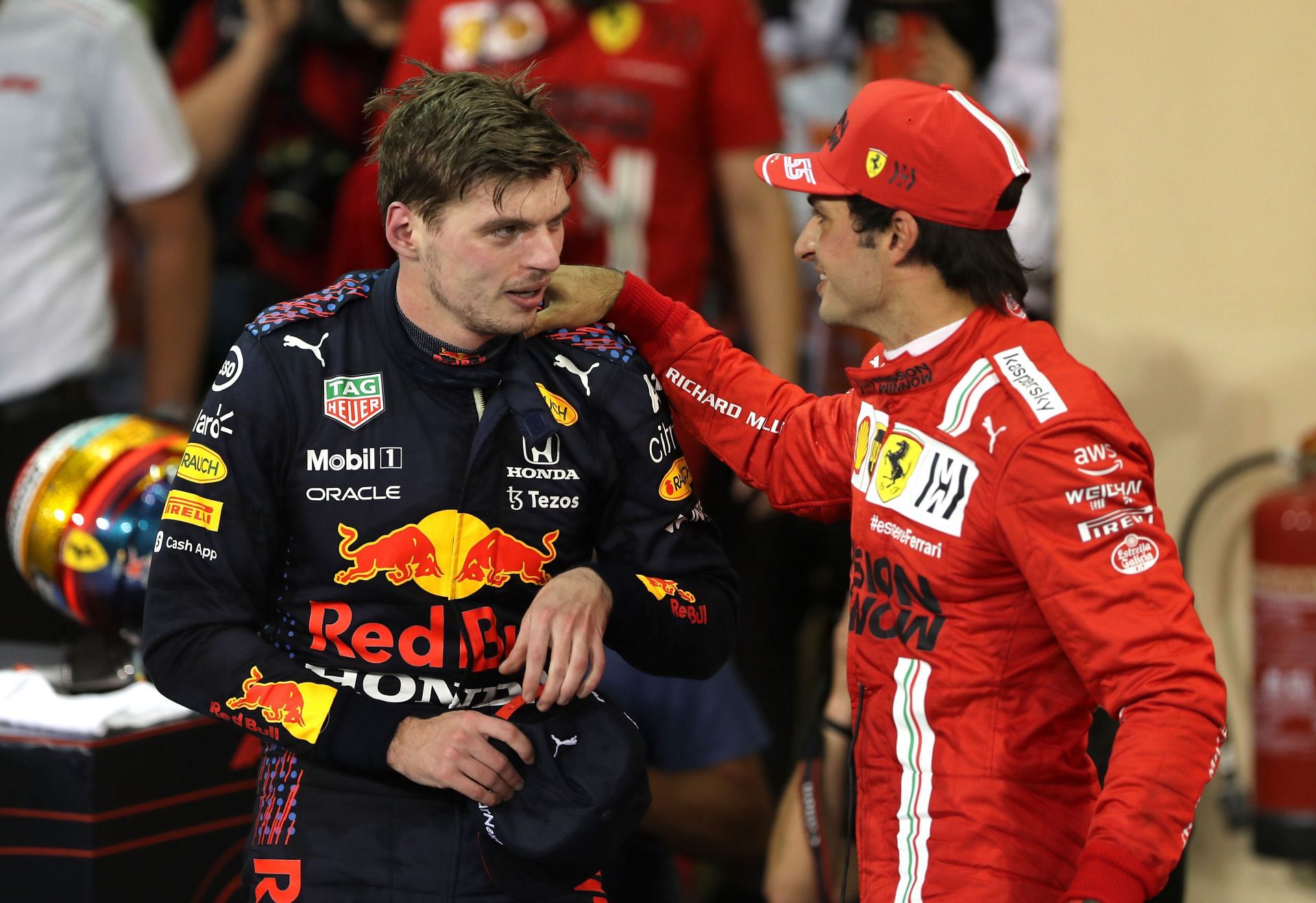 Race winner and 2021 F1 World Drivers&#039; Champion Max Verstappen is congratulated by Carlos Sainz in parc ferm&eacute; after the 2021 Abu Dhabi GP (Photo by Kamran Jebreili - Pool/Getty Images)