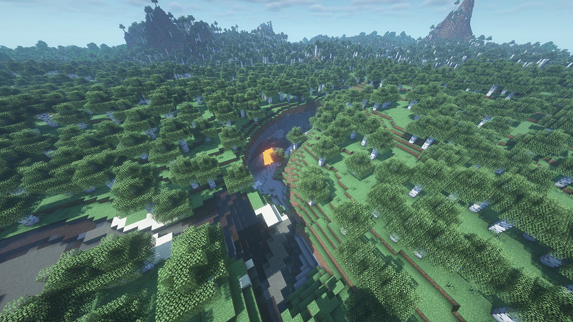 This seed has a curving ravine at spawn (Image via Minecraft)