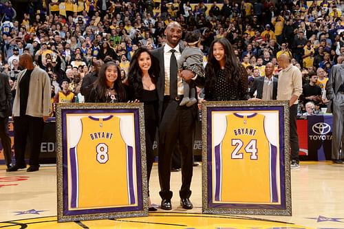 The late Kobe Bryant's Nos.8 and 24 jerseys were honored by the LA Lakers four years ago today. [Photo: Bleacher Report]