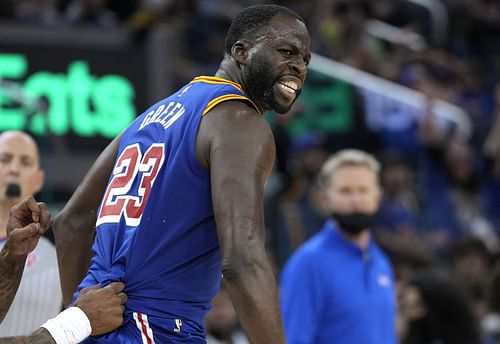 Draymond Green #23 of the Golden State Warriors reacts after scoring against the Memphis Grizzlies during the third quarter at Chase Center on December 23, 2021 in San Francisco, California.