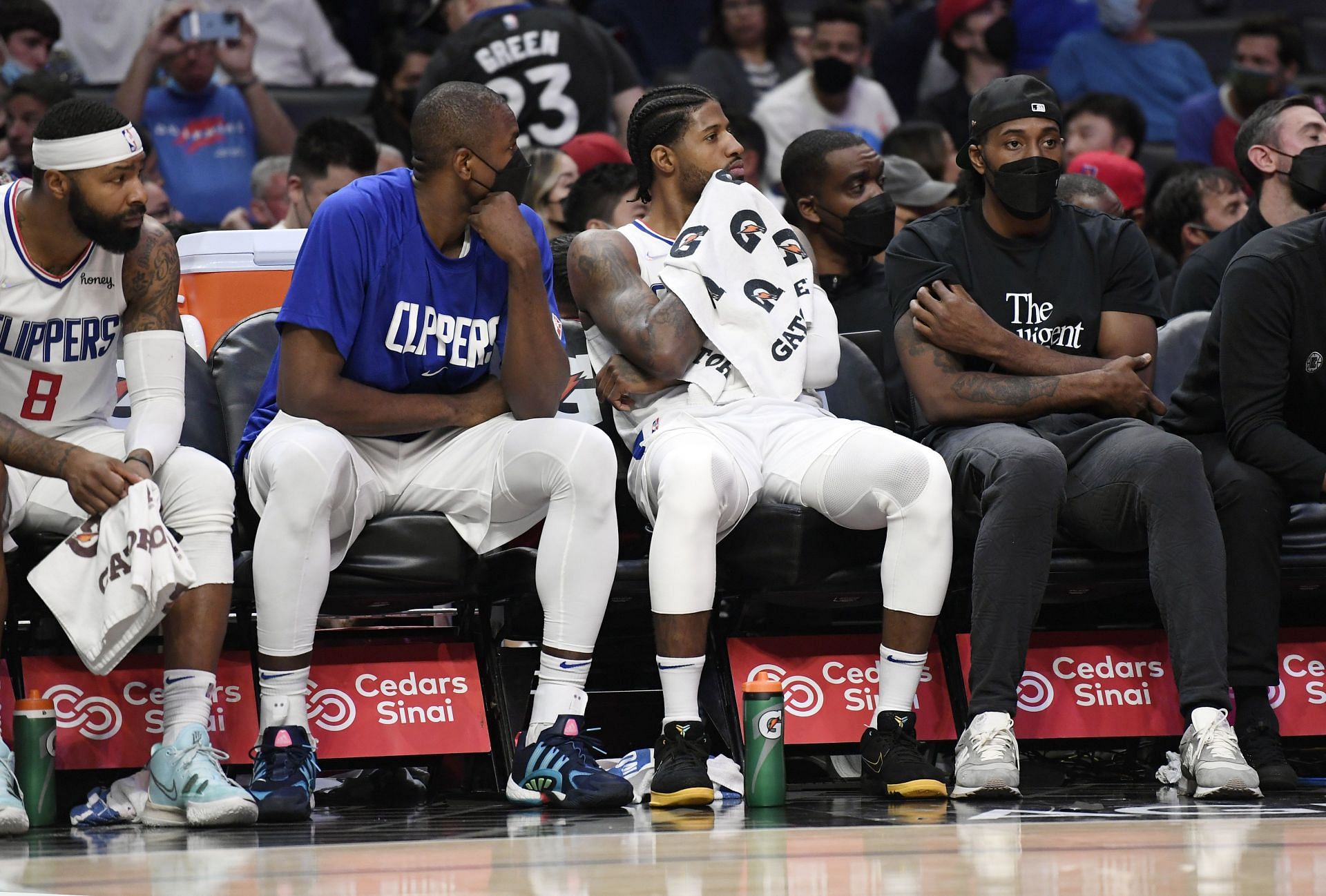 Paul George and Kawhi Leonard of the LA Clippers are on the bench
