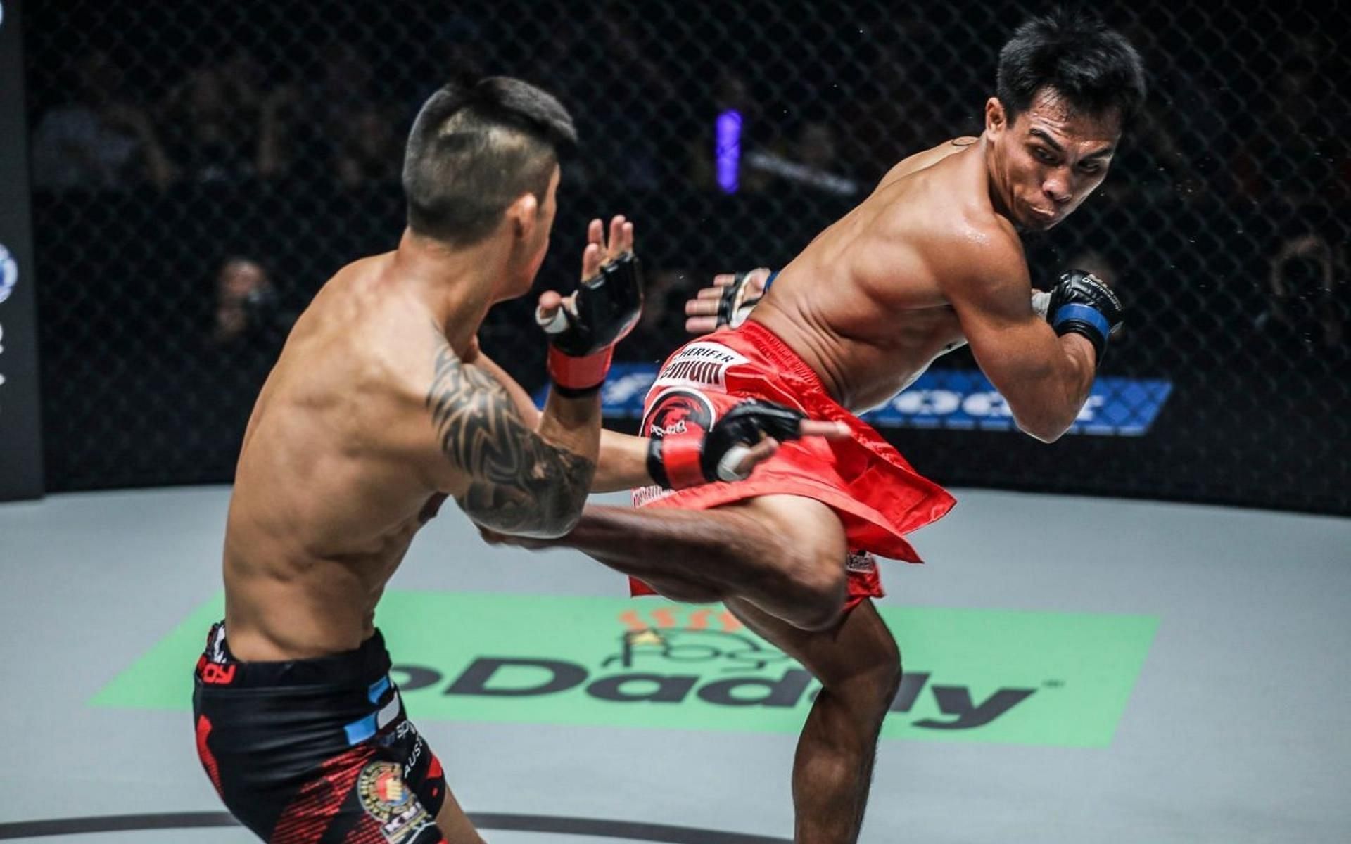 Former ONE Championship bantamweight world champion Kevin Belingon (right) has one of the best spinning side kicks in MMA today. (Image courtesy of ONE Championship)