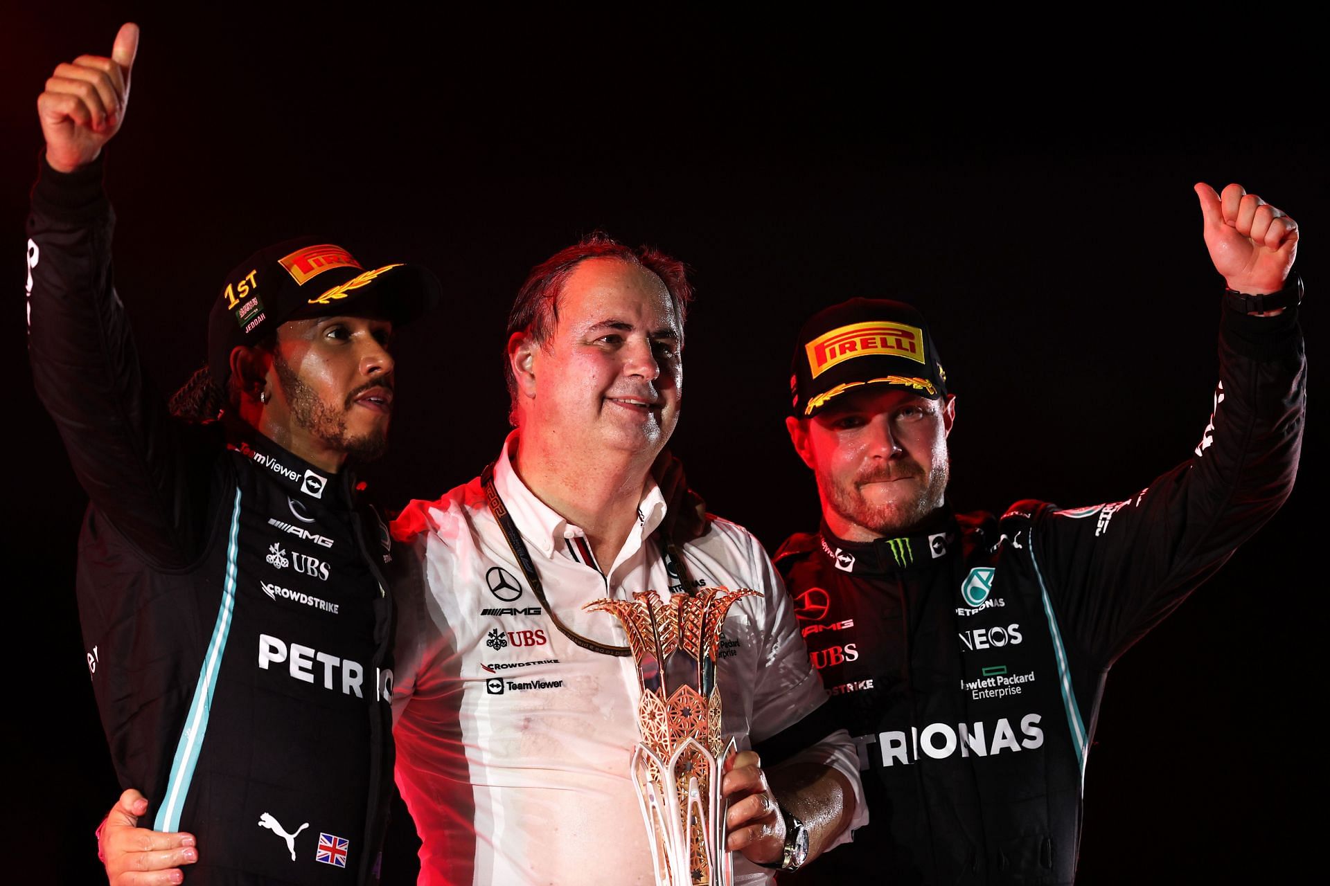Lewis Hamilton (extreme left) and Valtteri Bottas (extreme right) on the podium at the Saudi Arabian GP. (Photo by Lars Baron/Getty Images)