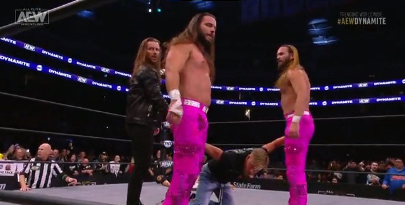 Adam Cole and the Young Bucks attacking Orange Cassidy