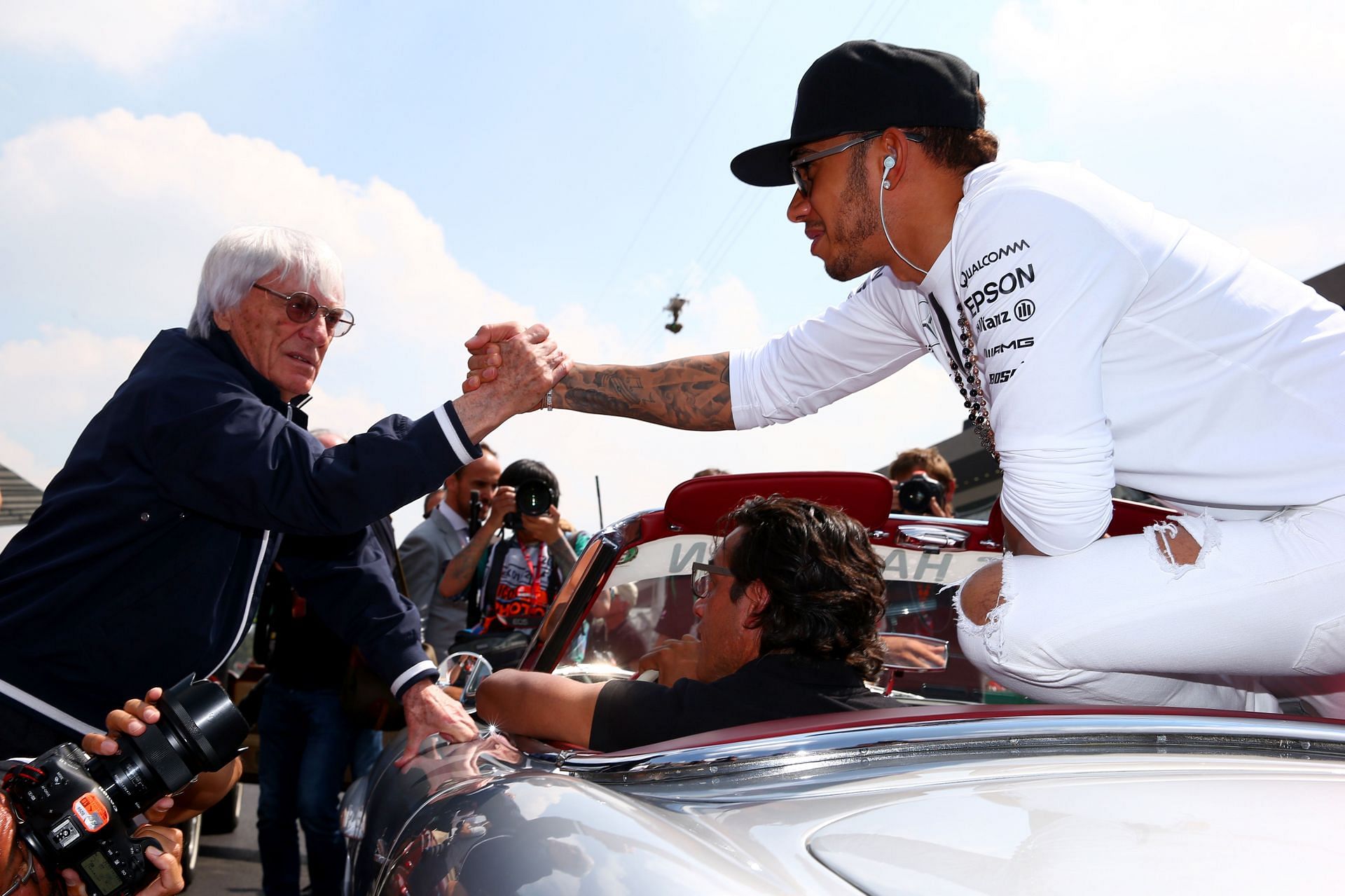 Bernie Ecclestone (left) and Lewis Hamilton (right) at the 2015 Mexican Grand Prix (Photo by Mark Thompson/Getty Images)