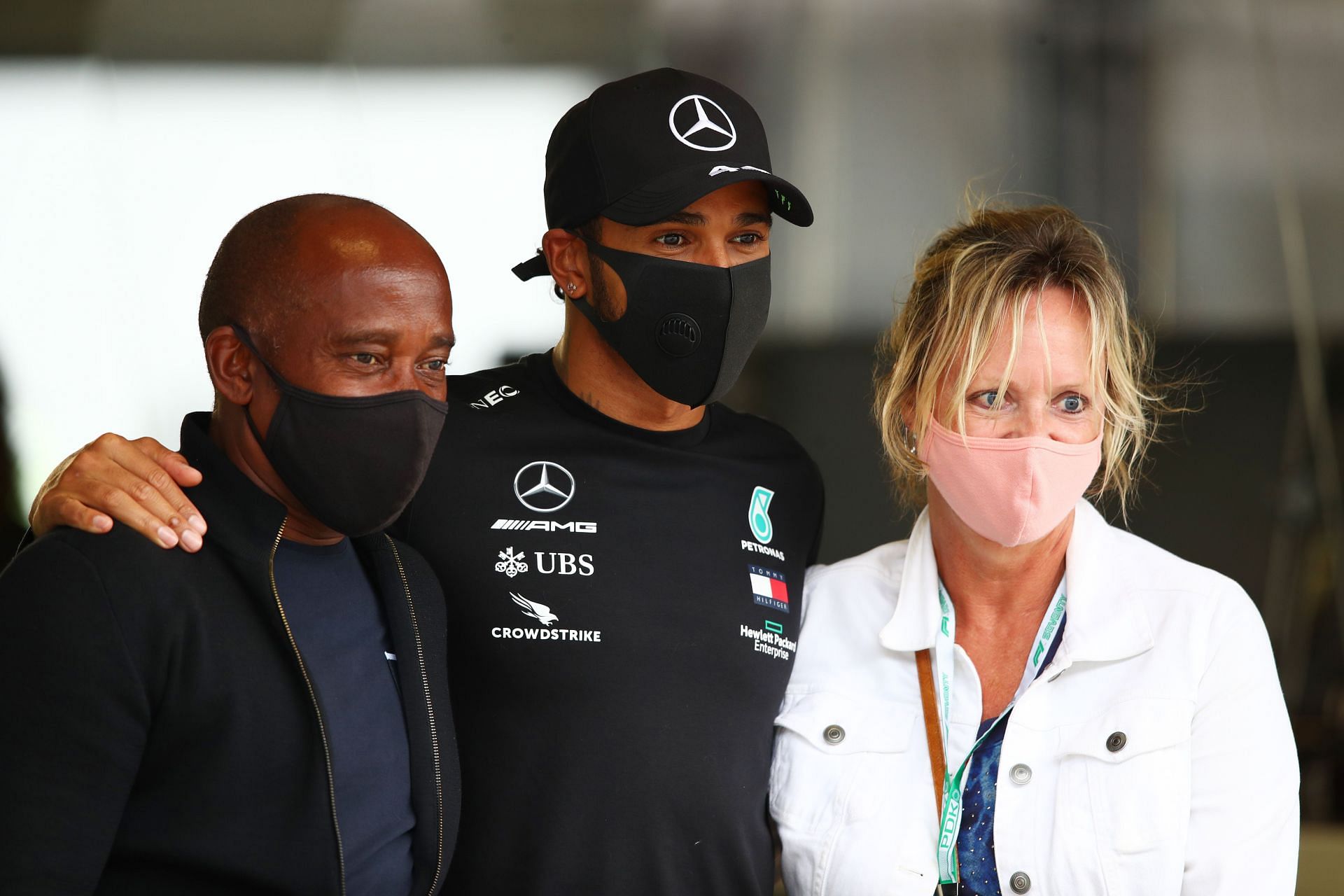 Anthony Hamilton (left ) and Lewis Hamilton (center) (Photo by Joe Portlock/Getty Images)