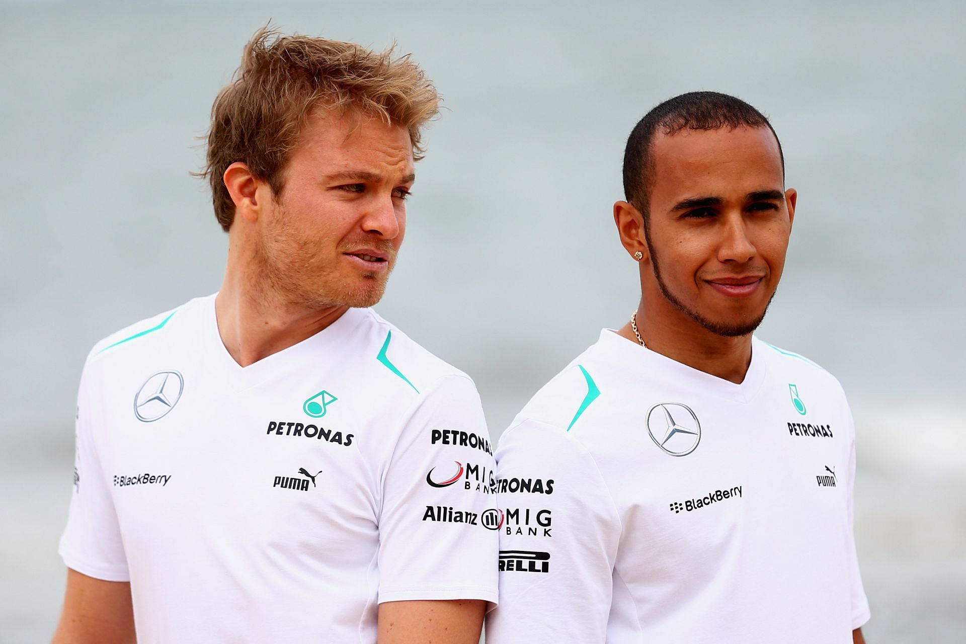 Nico Rosberg (left) and Lewis Hamilton (right) ahead of the 2013 Australian Grand Prix