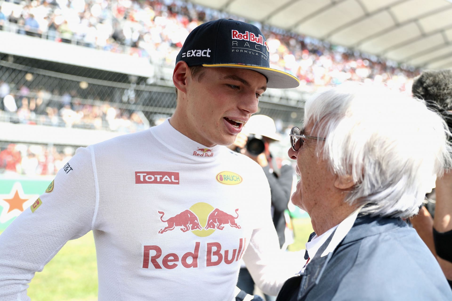 Max Verstappen talks with F1 supremo Bernie Ecclestone on the grid before 2021 Mexican GP. (Photo by Mark Thompson/Getty Images)