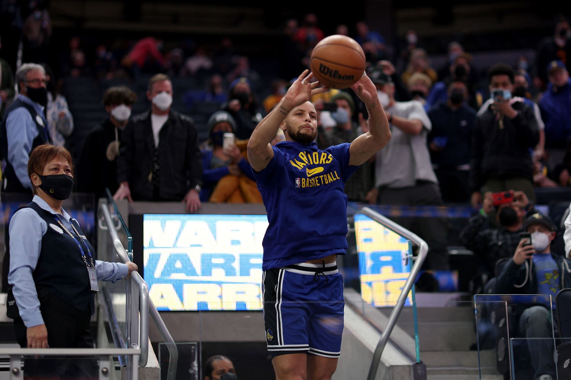 Steph Curry shoots the ball from the tunnel before the Denver Nuggets v Golden State Warriors game