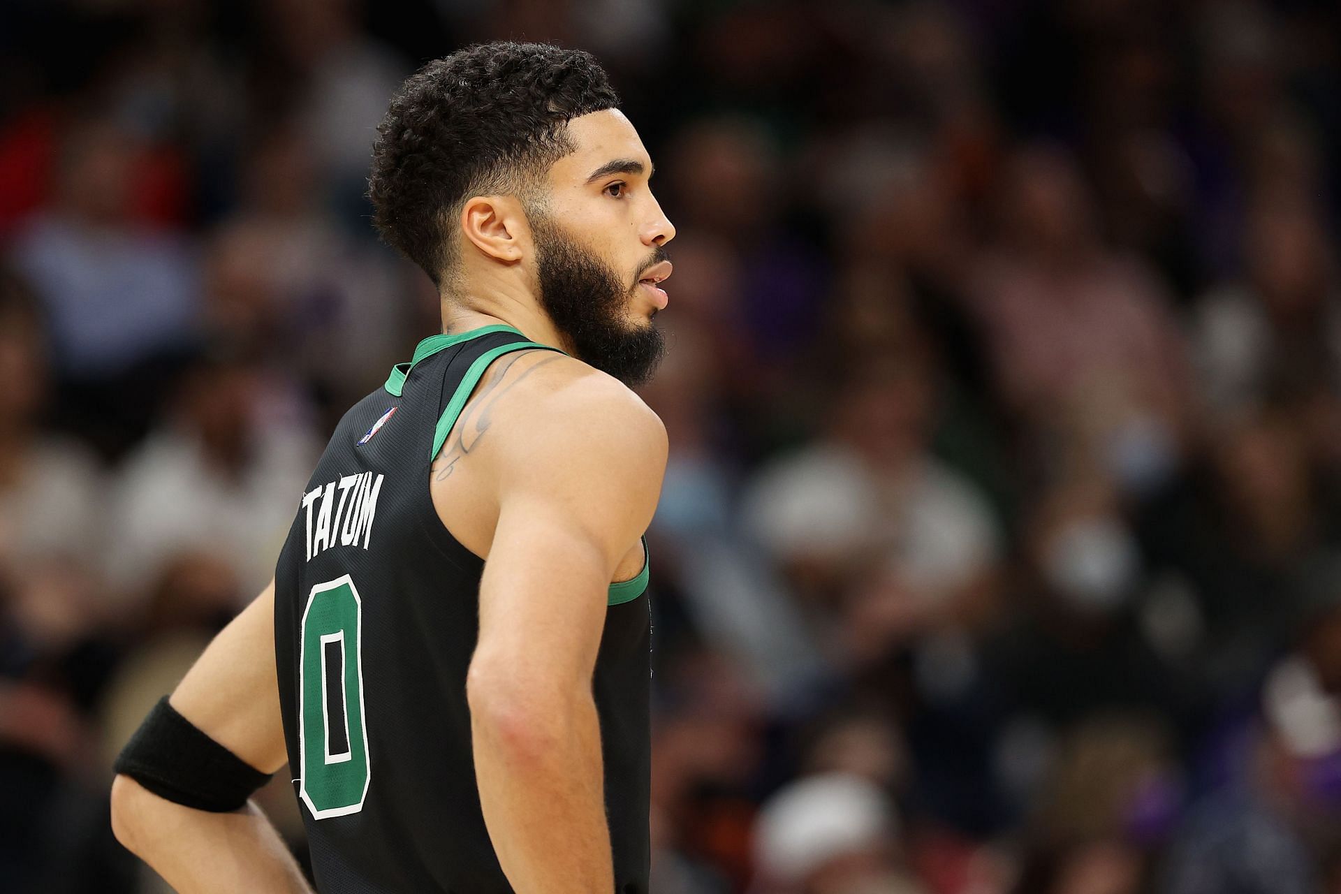 Jayson Tatum #0 of the Boston Celtics reacts during the first half of the NBA game against the Phoenix Suns at Footprint Center on December 10, 2021, in Phoenix, Arizona.