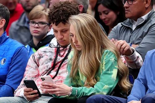 Brittany Matthews and Patrick Mahomes at an NBA game