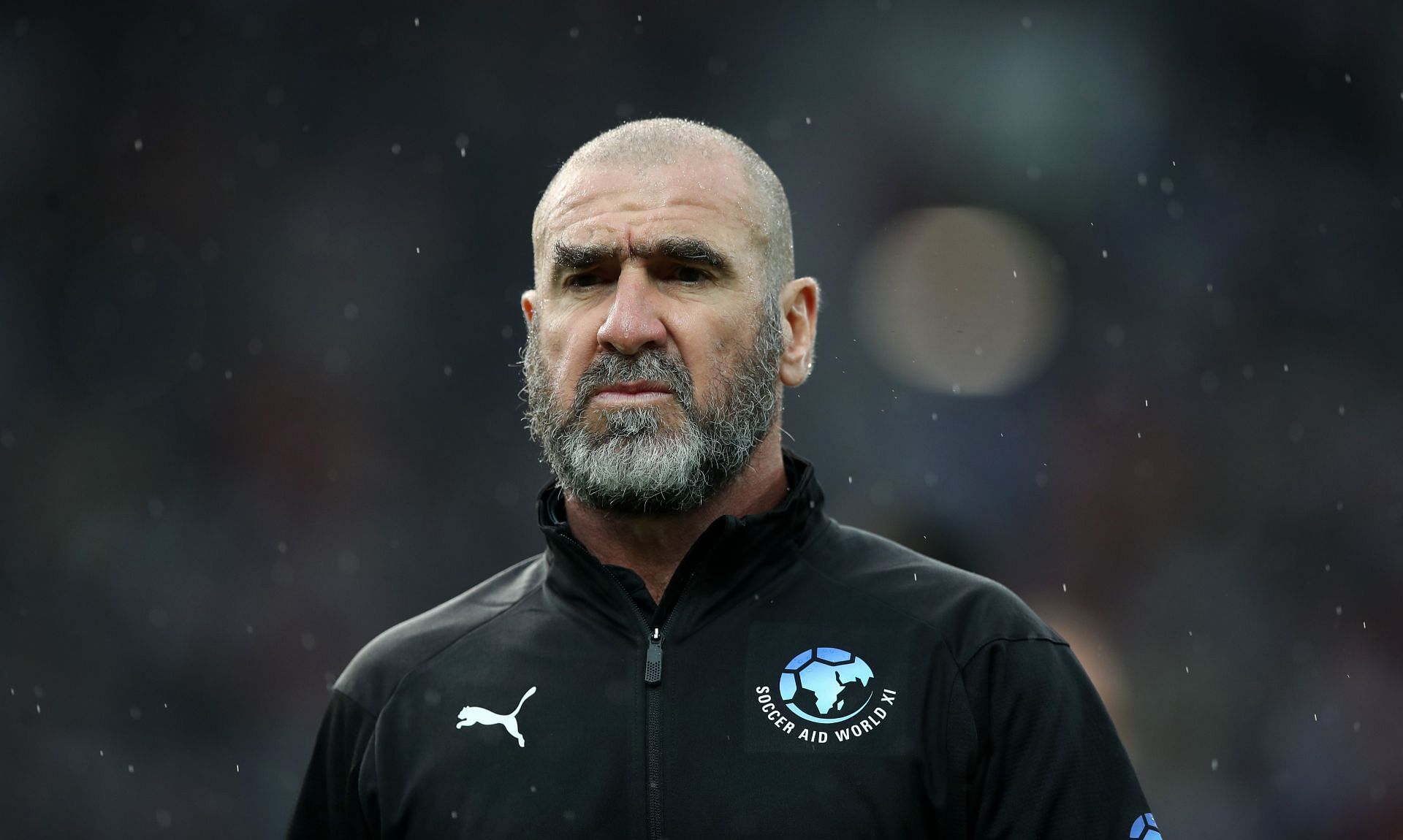 French former player Eric Cantona looks on during the Soccer Aid for UNICEF 2018 match between England and The Rest of the World at Old Trafford on June 10, 2018 in Manchester, England.